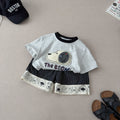 Conjunto de polera y pantalón corto con dibujos animados