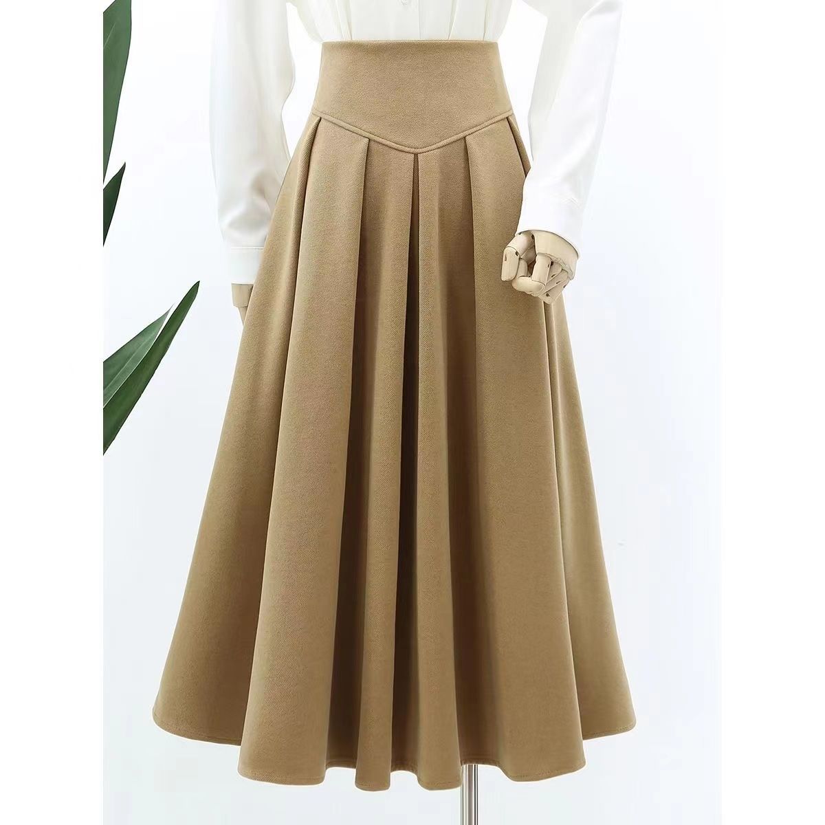 Falda plisada elegante de tiro alto